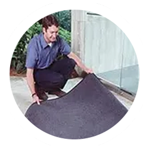 man fixing mat