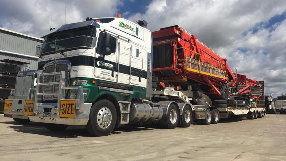 heavy hauler with asphalt machinery