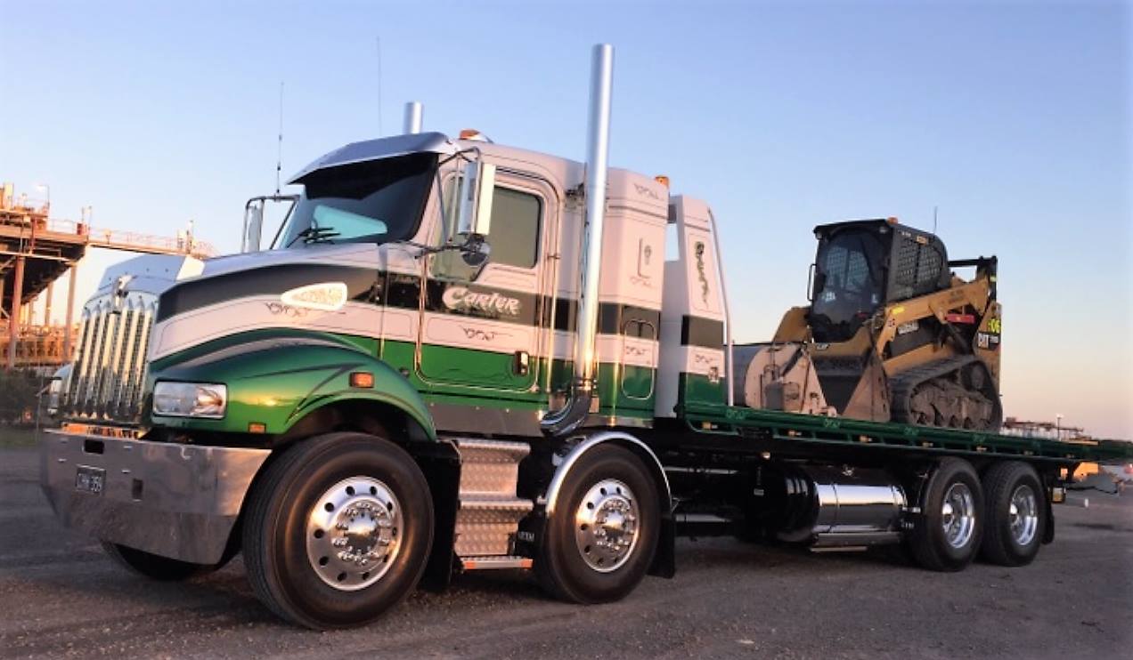 heavy hauler with excavator