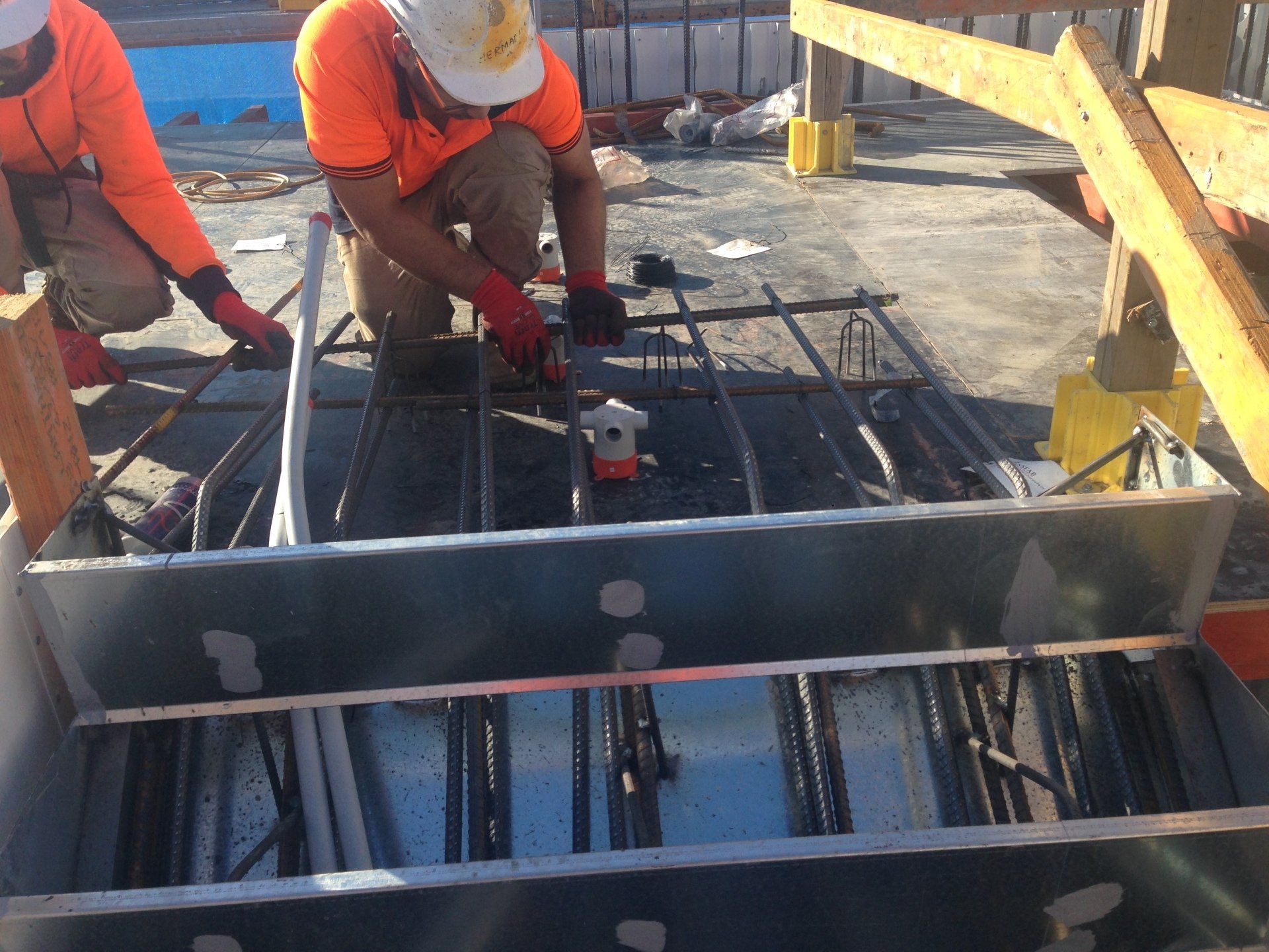 worker holding a steel bars