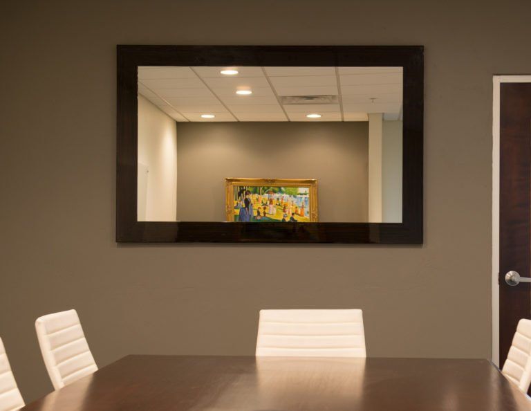 Hide your technology with invisible speakers and mirror televisions