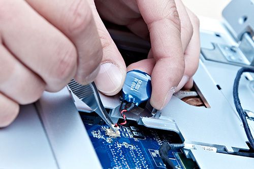 Expert repairing the equipment