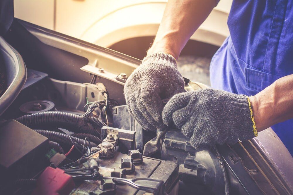 Mechanic Under the Car — Mechanical Repairs in Urunga, NSW