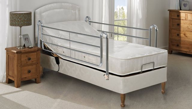 cot bed with adjustable sides