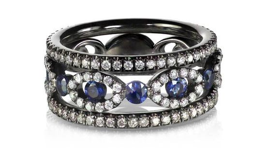 sapphire and diamond cocktail ring on white background