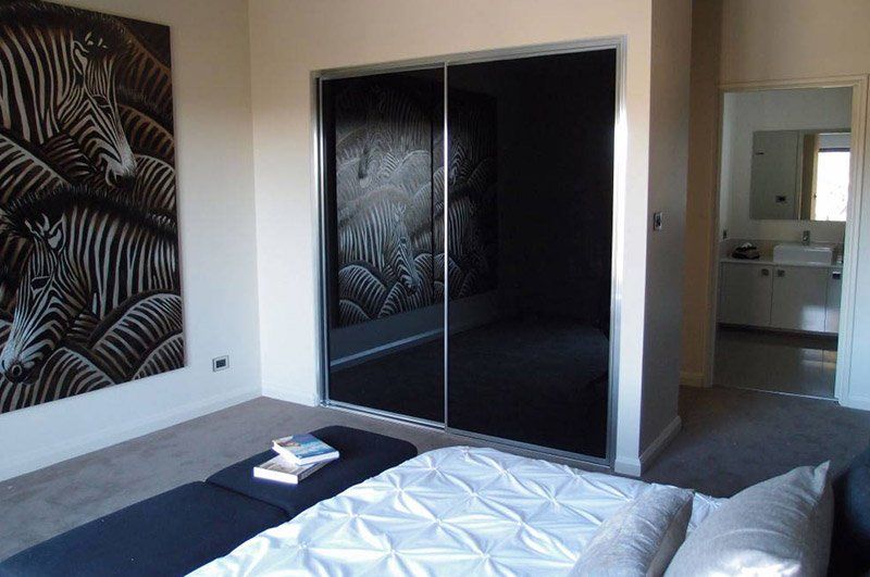 black glass sliding wardrobe doors