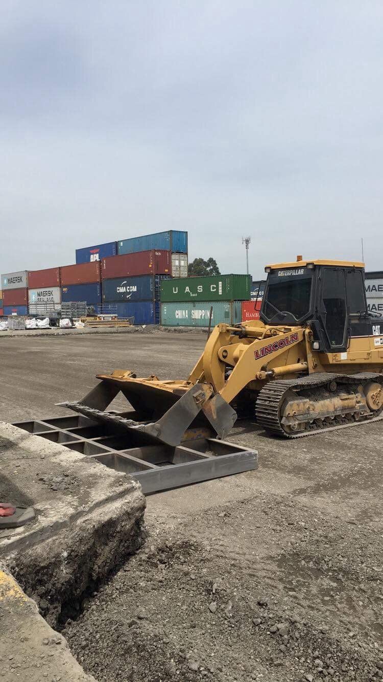 Machine being used for leveling the ground