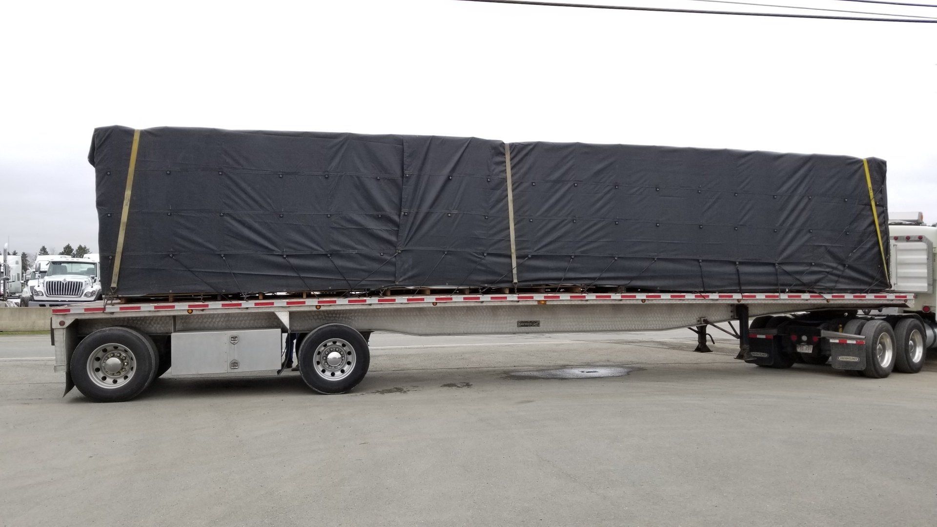 COVER-TECH | Flatbed Tarps | Truck Tarps | Steel & Lumber Tarps