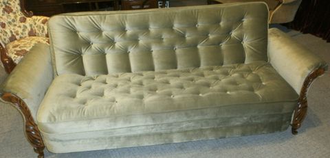 White colour upholstered sofa