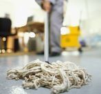 Man mopping a floor