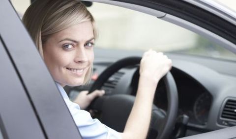 woman driving with auto insurance