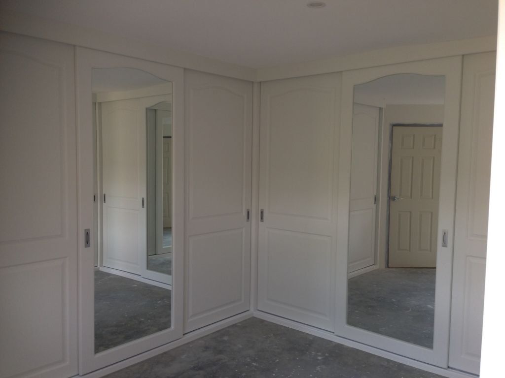 corner vinyl wrap with sliding doors and mirrors