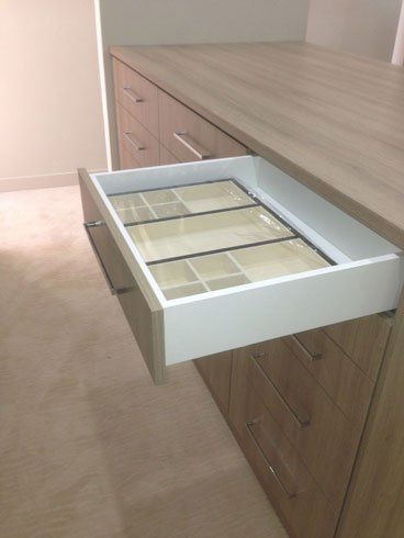 middle dresser with jewelery drawer opened