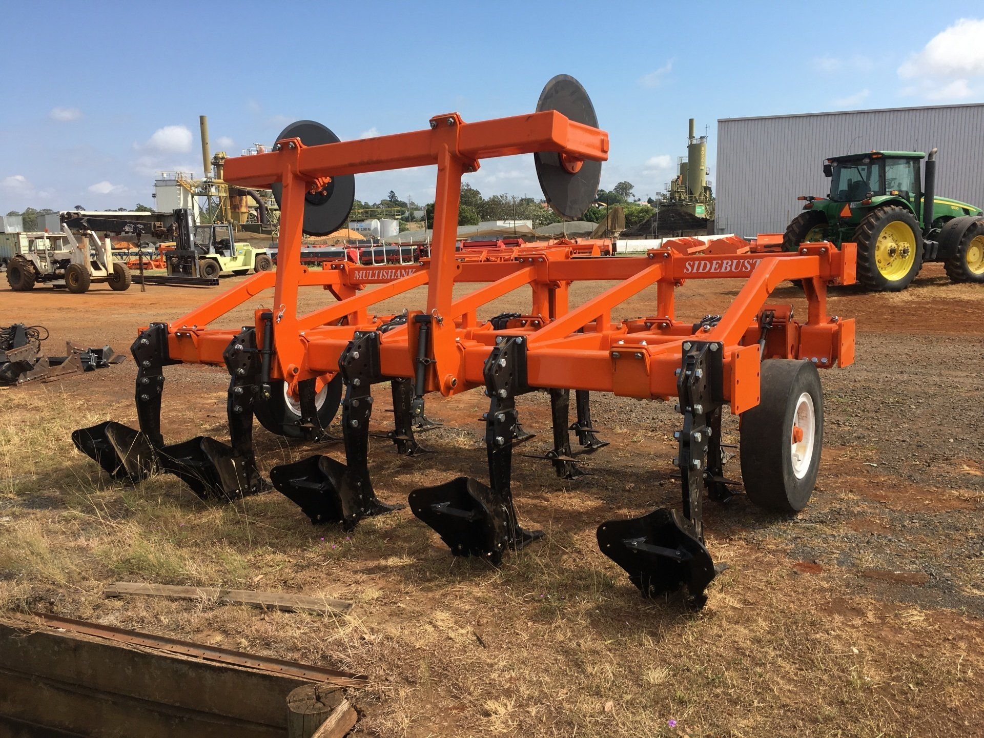 Row crop cultivating farming machinery
