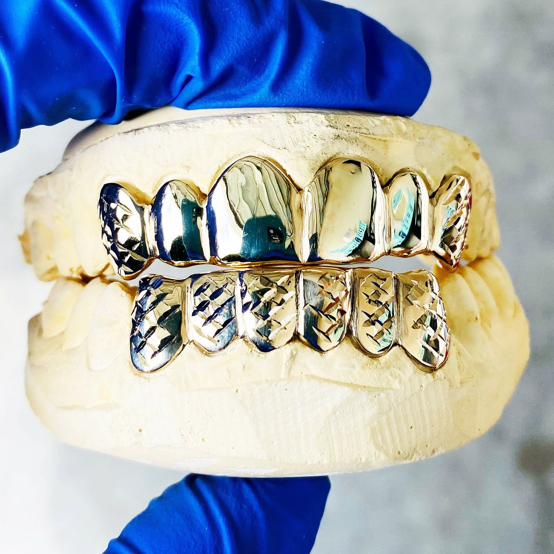 Custom Grillz at Ikonik Ink | 24kt Gold Grillz Studio in Lakewood, CO