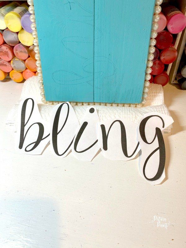 cutout letters, turquoise board