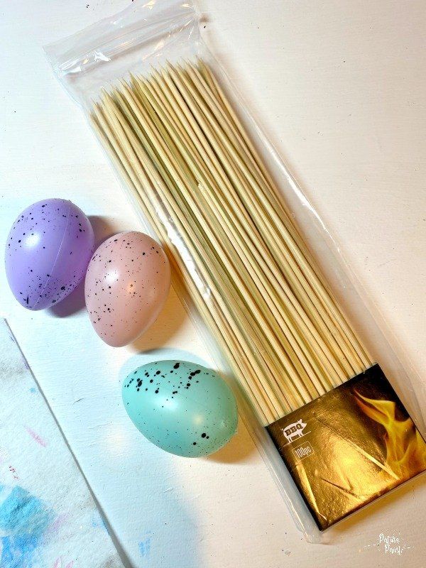 plastic easter eggs, wooden skewers