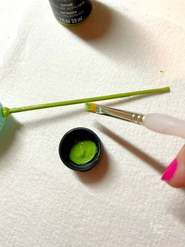 painting a wooden skewer