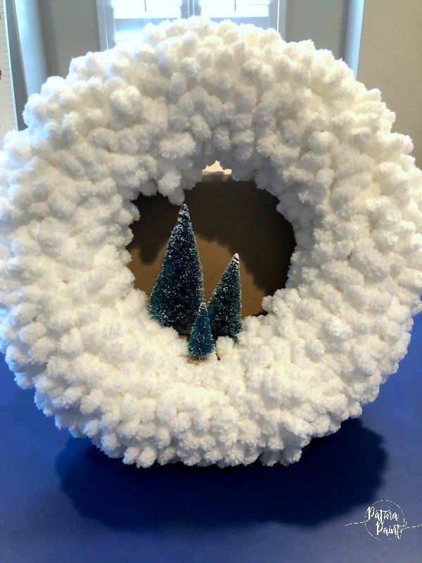 bottle brush trees in a loop yarn wreath