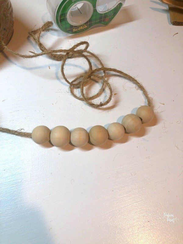wooden beads on twine
