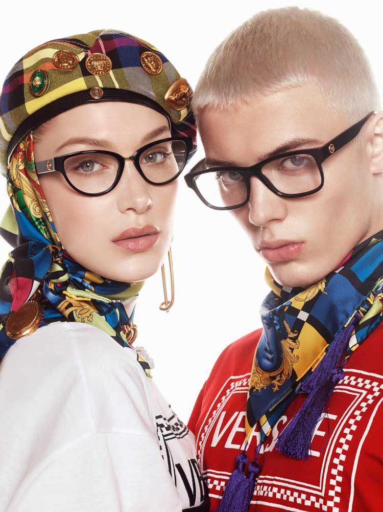 two people wearing black glasses