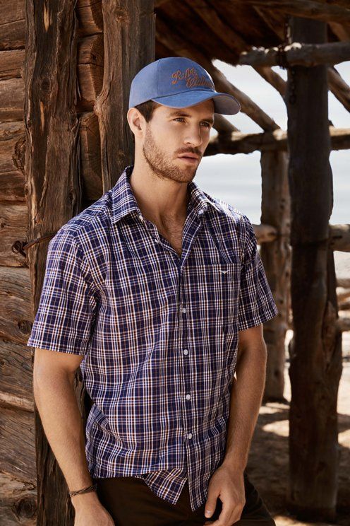 man in checkered polo