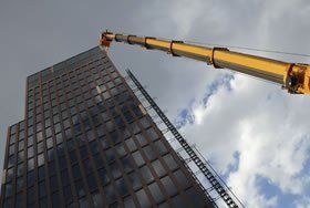 Pressure cleaning or steam cleaning of building facades, including multi storey buildings.