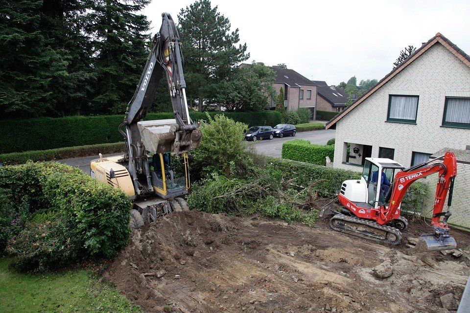 Backyard excavation by Derks24 for E & R Bobcat Excavation Services
