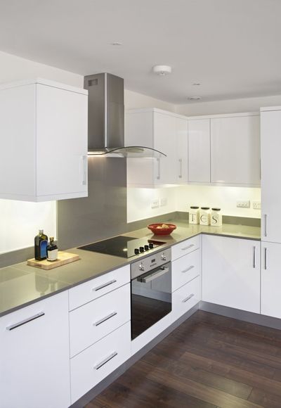 modern kitchen with white cabinets