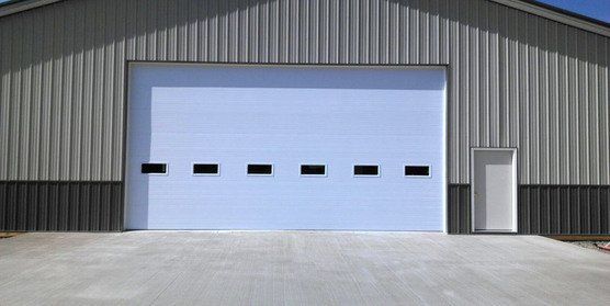 Overhead Doors & Fire Places in Montgomery GA - CommercialOverheaDDoor 556x279 556x279 1920w