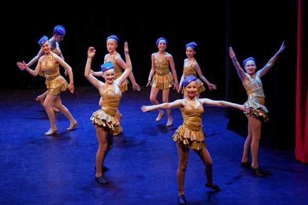 female children dancing on stage