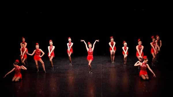 dancers in red
