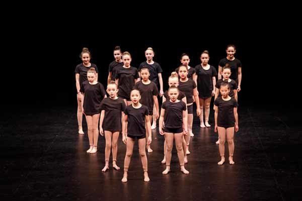 dance group wearing black