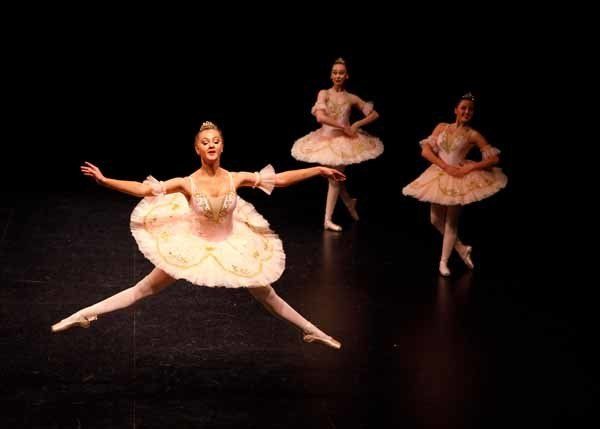 group of ballerinas on stage
