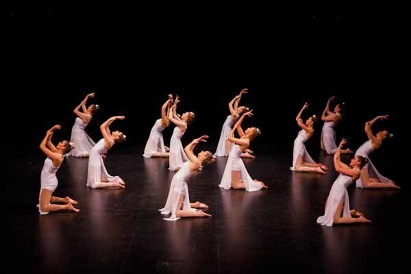 dancers performing on knees