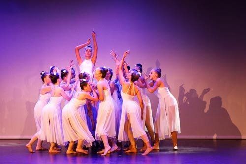 dancers in white dress costumes