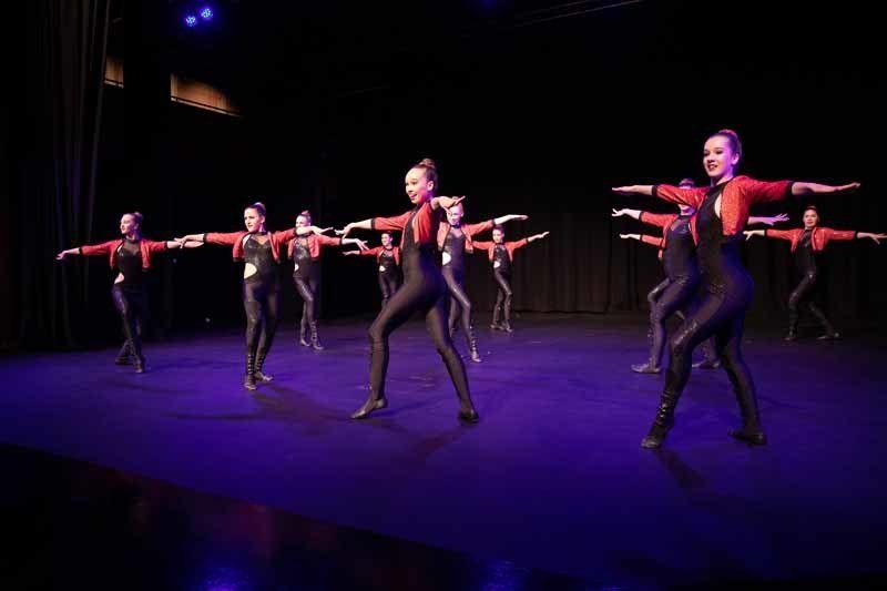 dancers on purple floor
