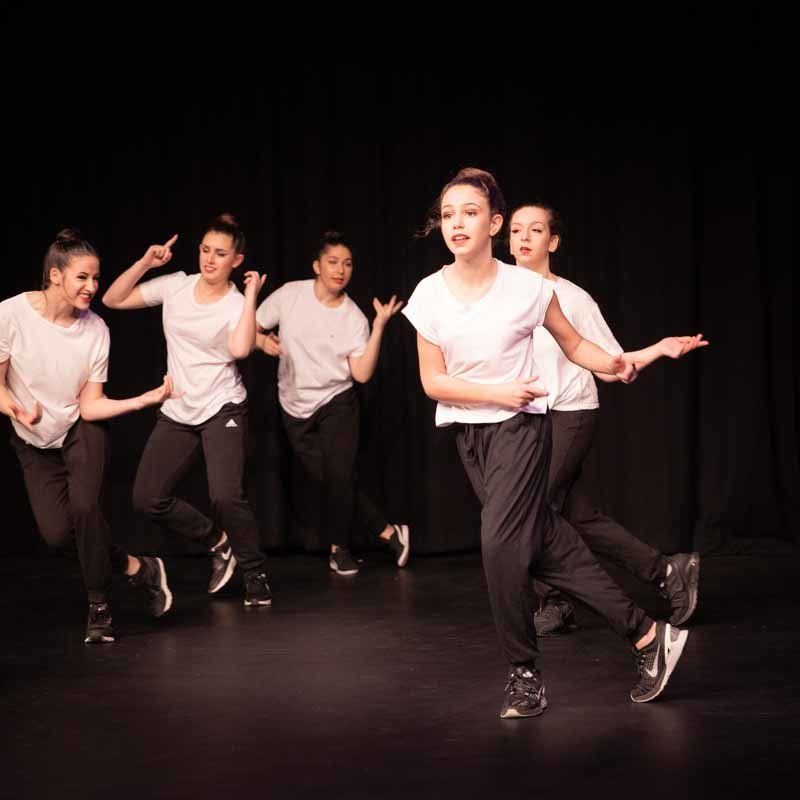 group dancers in black and white