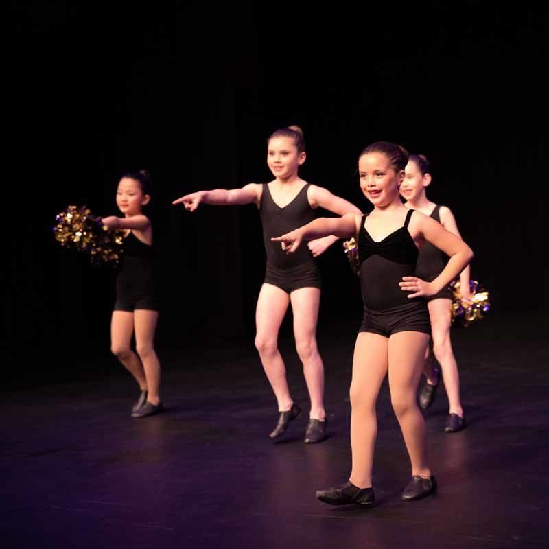 young girls in black dance outfits