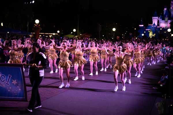dancers in gold during parade