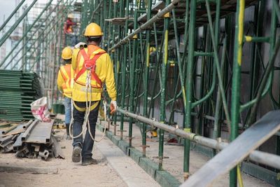 man wearing safety harness
