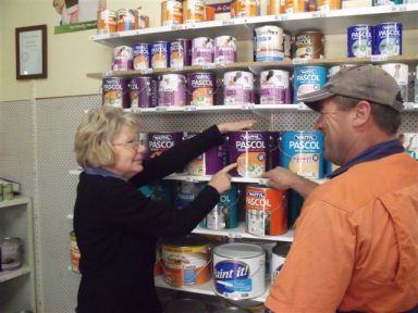 Staff showing customer paint types in Kyabram