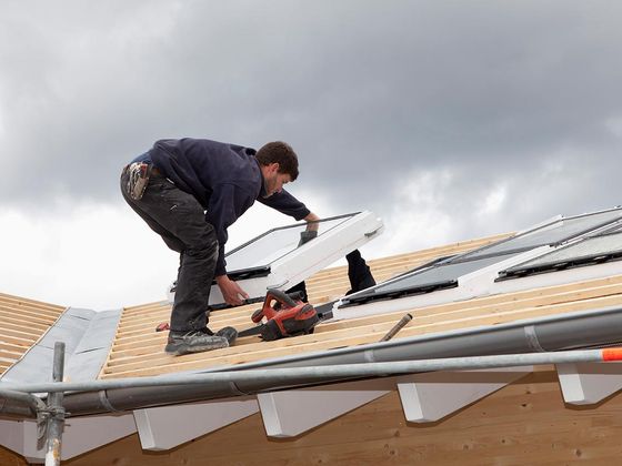 person replacing windows