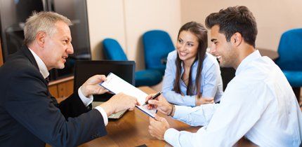 lawyer working with couple