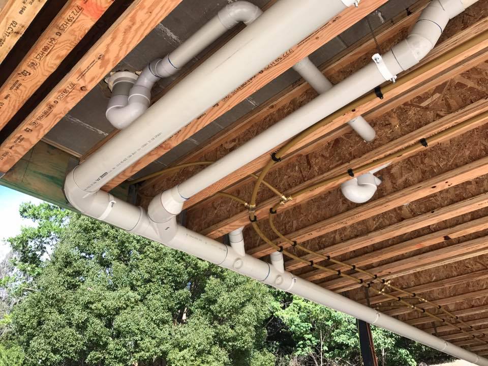 pipping under the wood floor