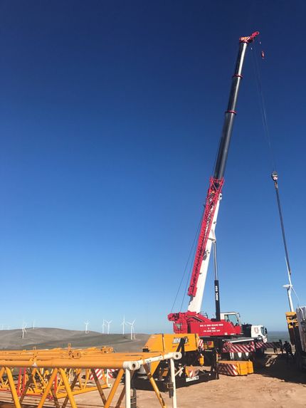 crane lifting metal beams